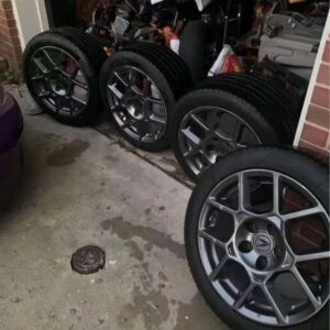 set of Acura TL type s rims and tires.