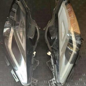 Left and Right Used C7 Corvette OEM headlights.