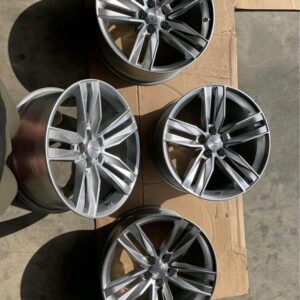 silver dual 5 spoke Camaro SS wheels.
