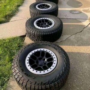 35" Jeep Tires w/ Mopar Rims.