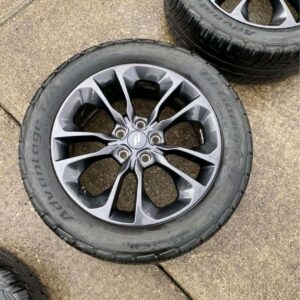 set of Dodge Durango Wheels and Goodyear Duratrac Tires.