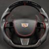 CTS-V2 carbon fiber steering wheel with airbag and shifter paddle.